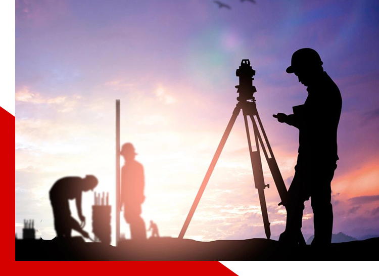 Silhouette survey engineer working in a building site